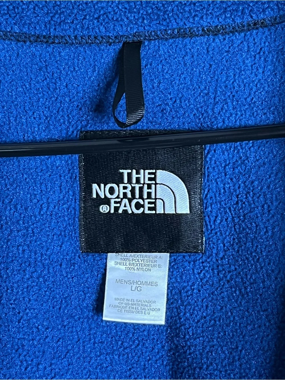 The North Face Men’s Black Denali Jacket with Blue Fleece Lining